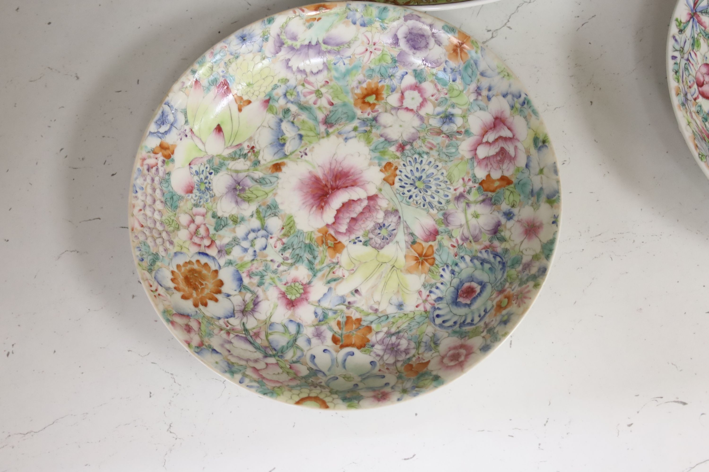 Two Chinese ‘millefleur’ dishes, a turquoise ground ‘Dragon’ dish Guangxu mark and period, a late 19th century famille rose jar etc.